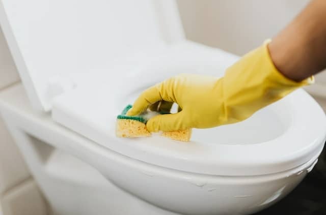 domestic deep cleaning of a bathroom and toilet bowl