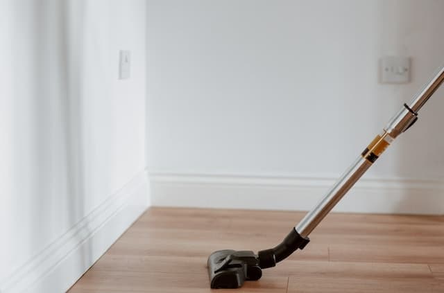 home cleaning service including vacuuming and mopping of floor